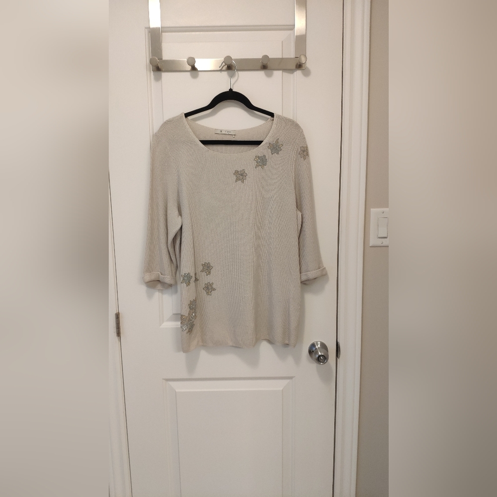 Elegant Beige Knit Sweater with Embellished Leaf Details